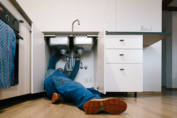 Professional Drain Cleaning technician working in Henderson, TN